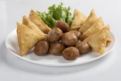 fried indian dish samosha indian delicious deep fried breakfast samosa also know as samoosa isolated wooden texture background 258423207